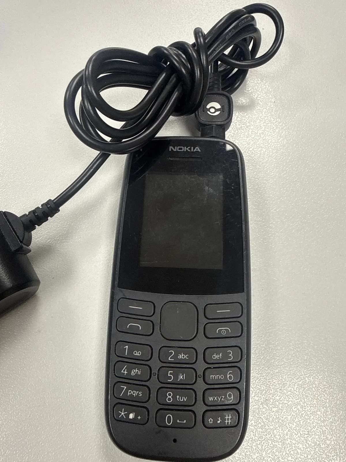 Mob.tel Nokia 1202 (Комплект зарядных устройств)