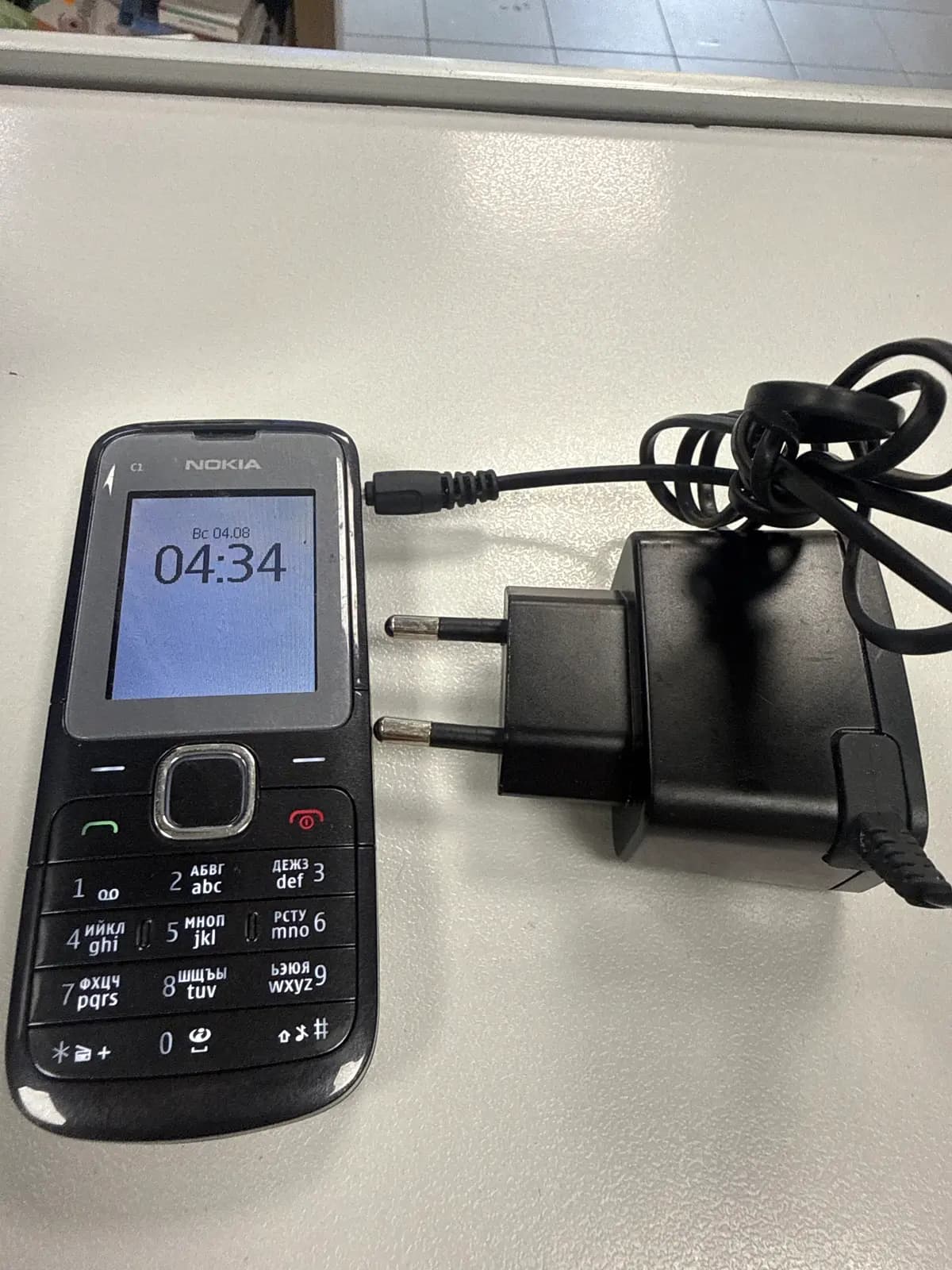 Mob.tel Nokia C1(Комплект зарядных устройств)