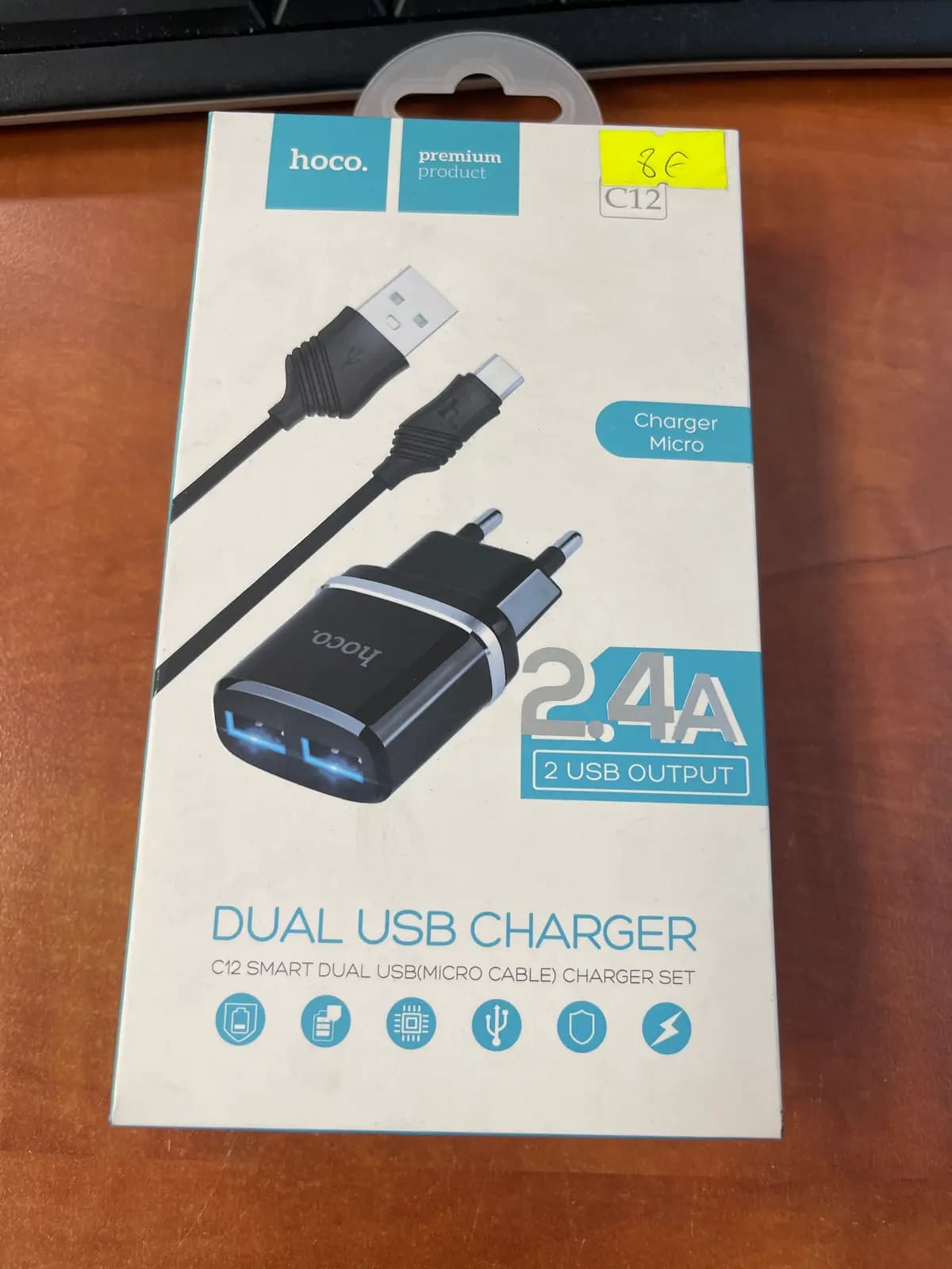 HOCO C12 įkroviklis, 2×USB, 2,4 A, juodas, su „Micro USB“ kabeliu